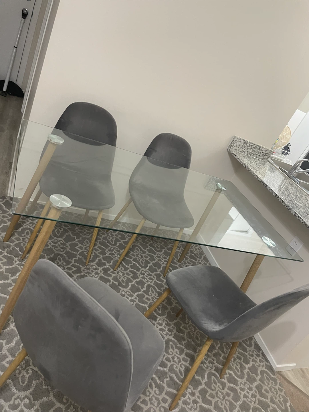 Glass Dining Table with 4 Grey Velvet Chairs