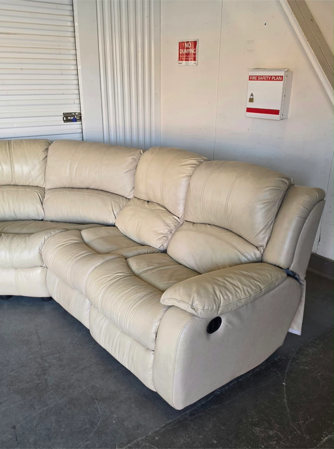 Spacious sectional sofa is upholstered in cream leather. - photo 4