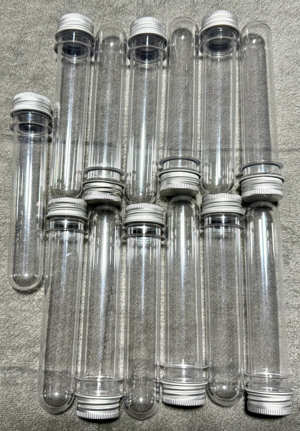 Set of 13 Clear Plastic Storage Tubes with Silver Lids