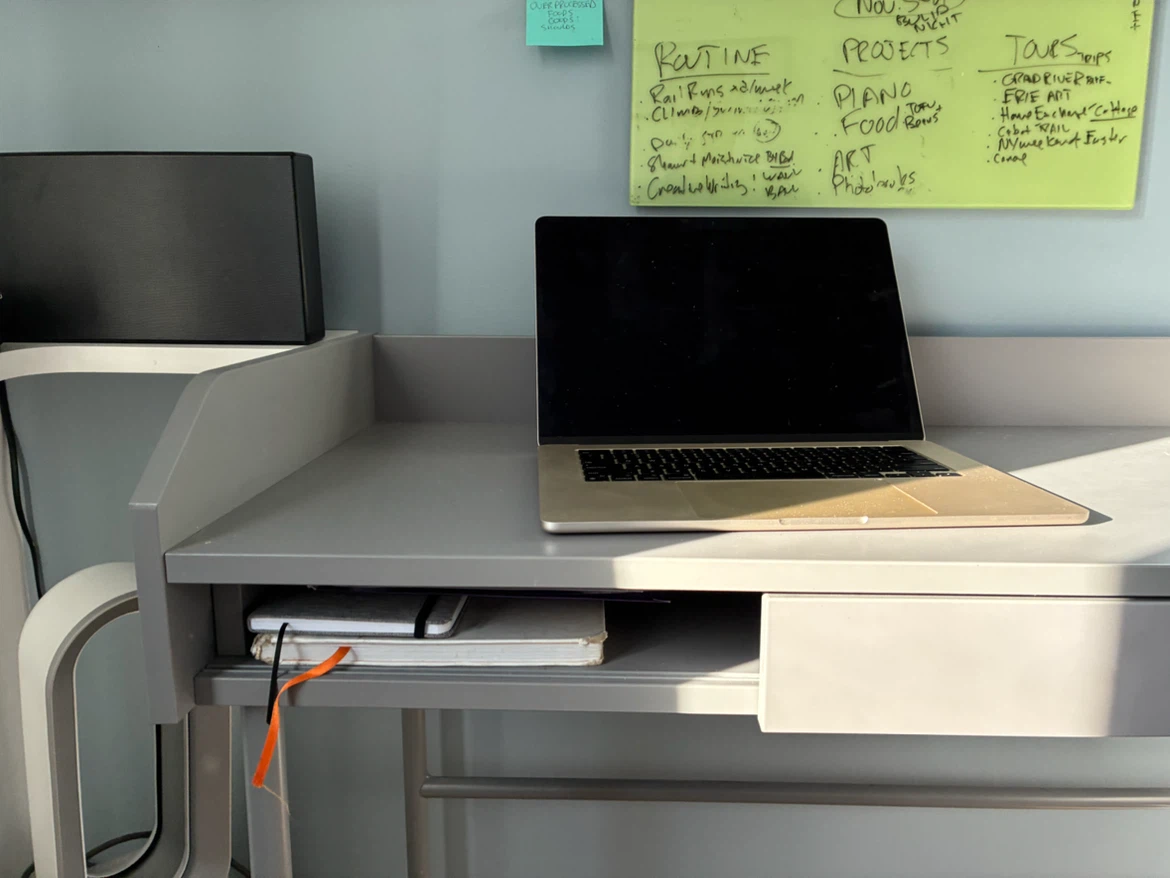 Grey computer desk.