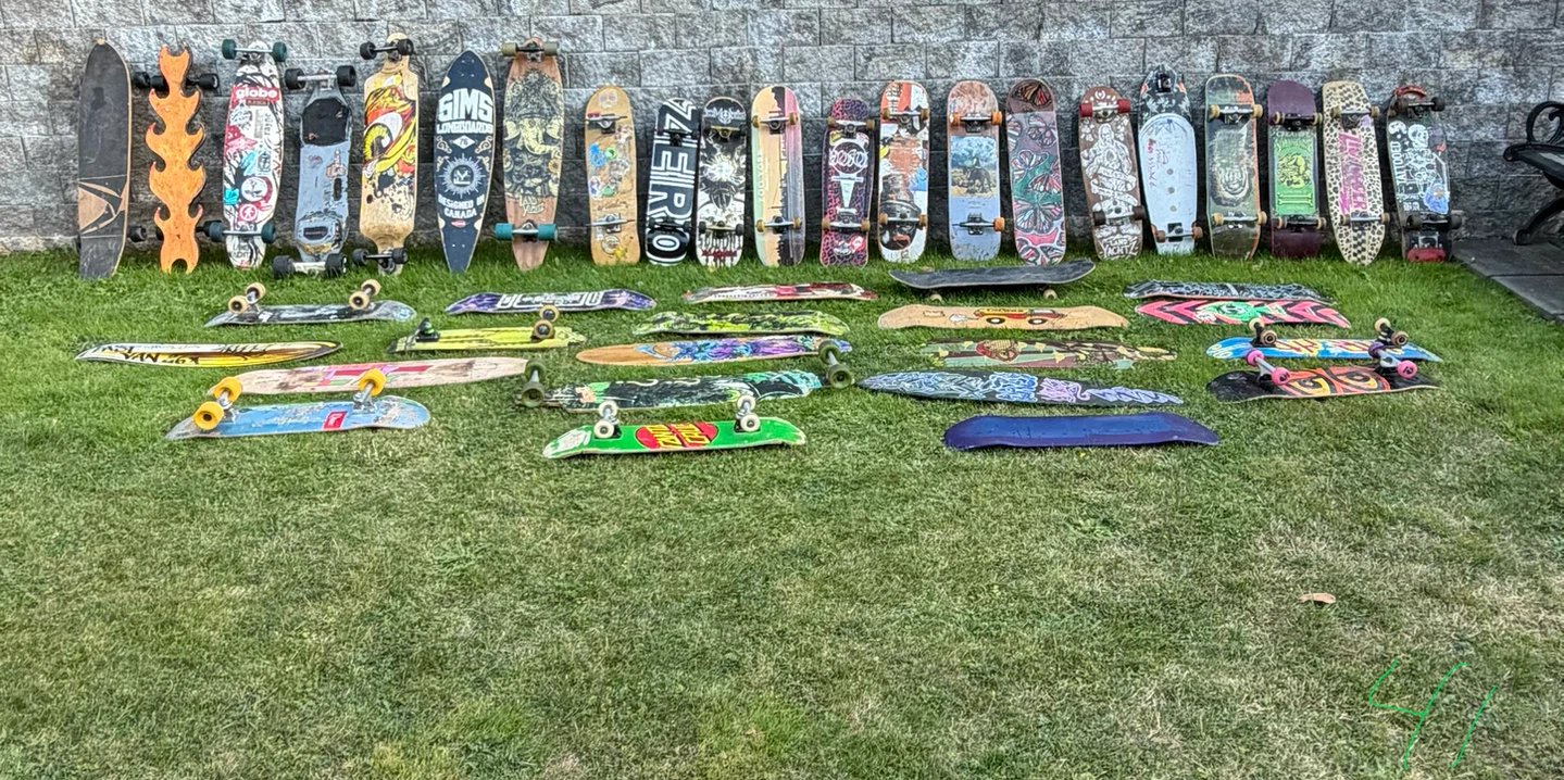 Large collection of 42 assorted skateboards  and longboards