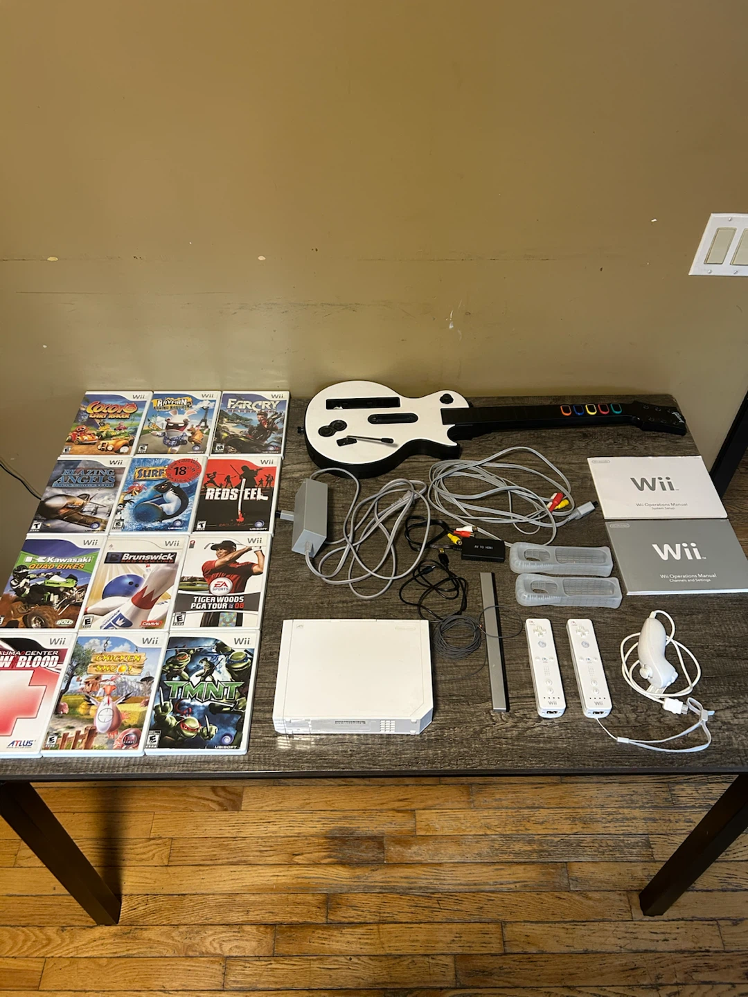 Nintendo Wii Bundle with Guitar Hero Controller and 12 Games