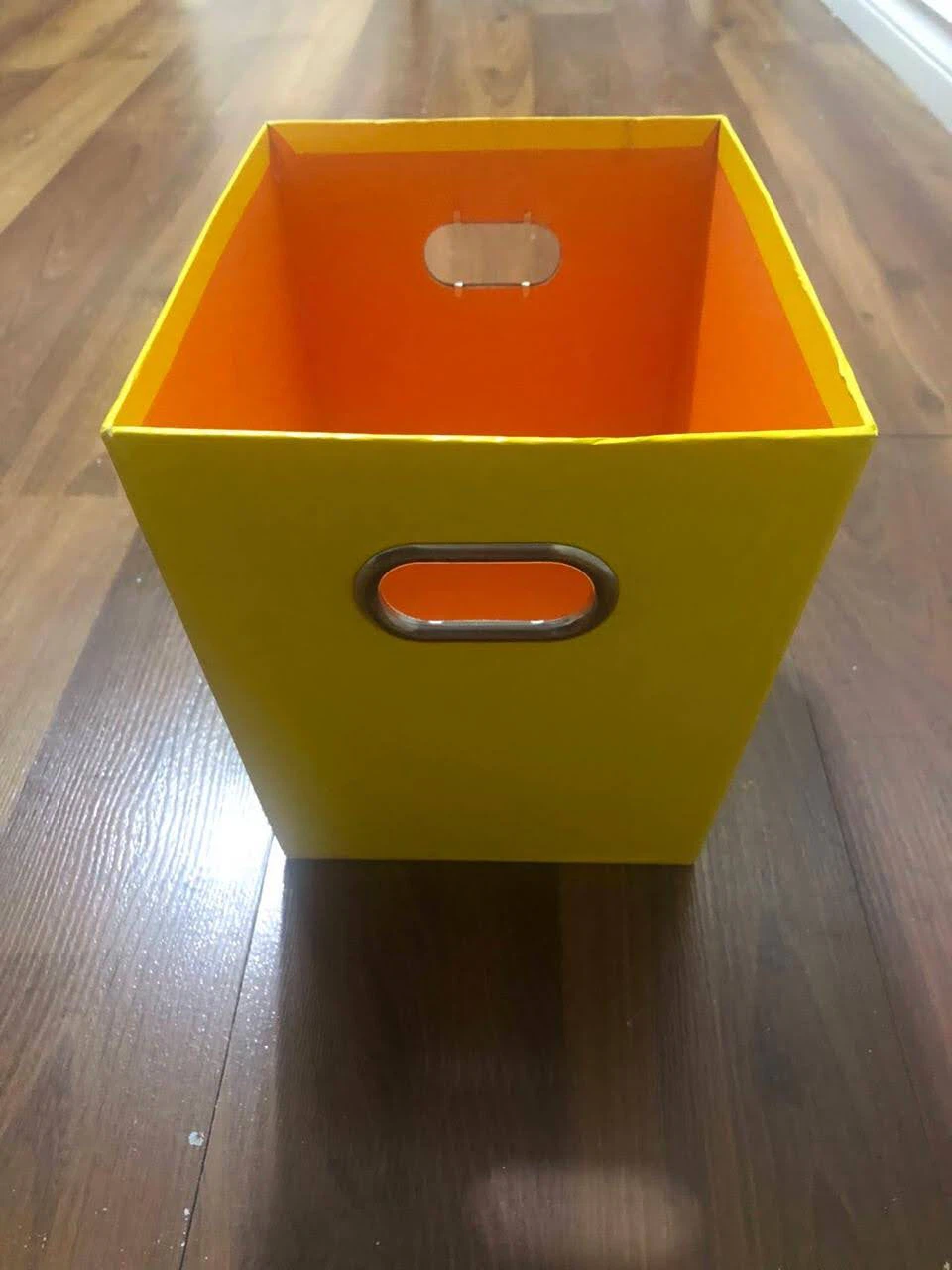 Yellow and orange storage bin