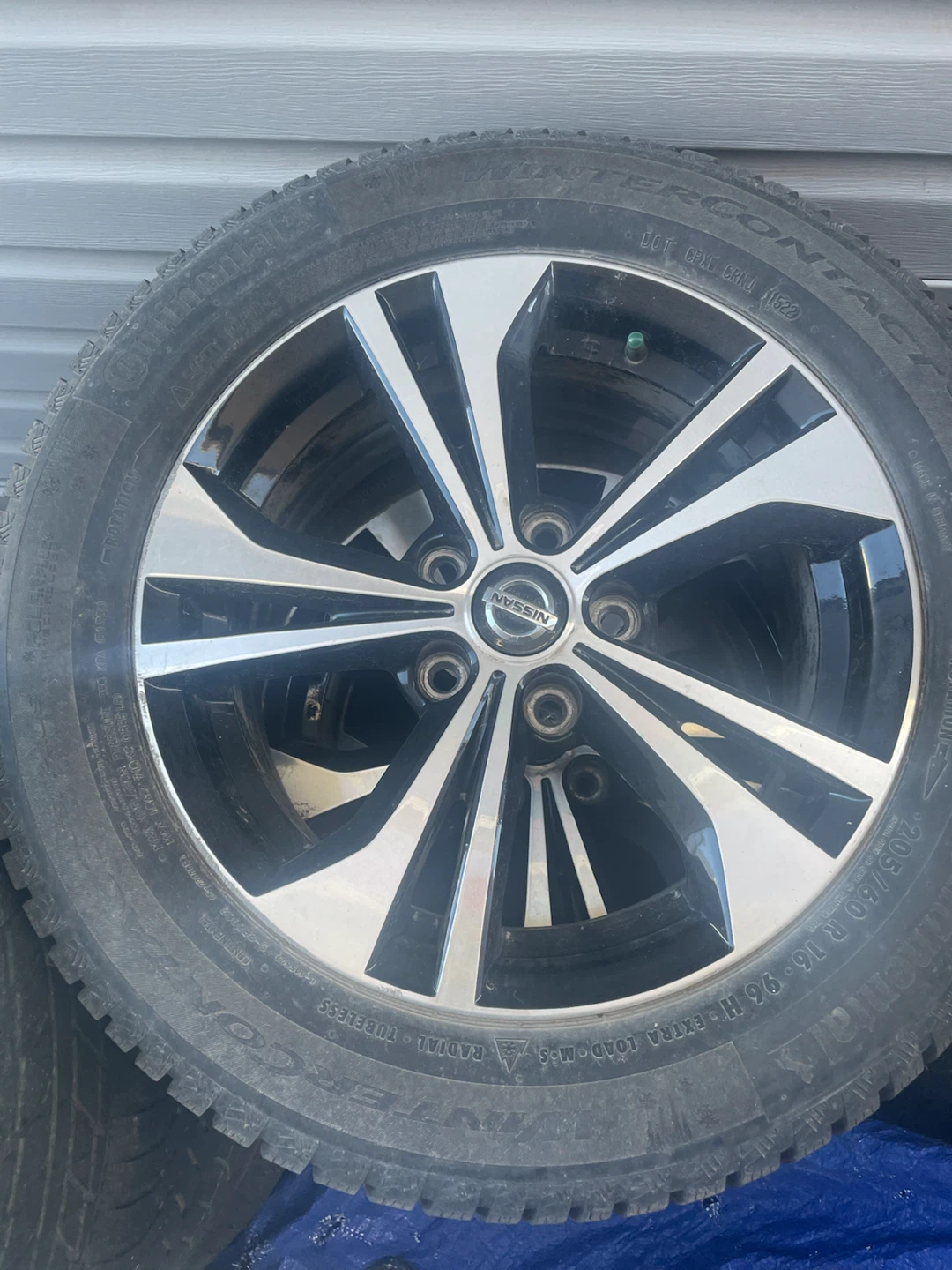 Set of 4 Continental WinterContact Tires and Nissan Rims