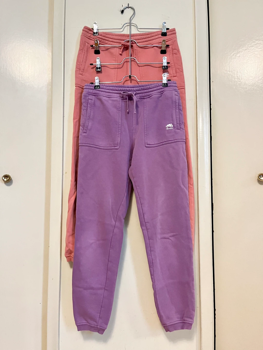 Two pairs of Roots sweatpants size S