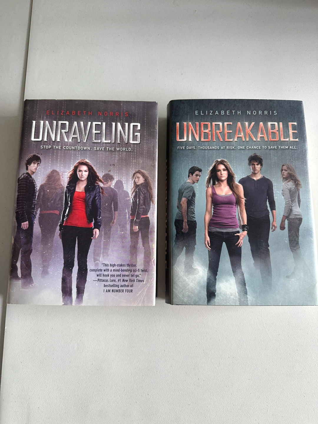 Unraveling and Unbreakable by Elizabeth Norris