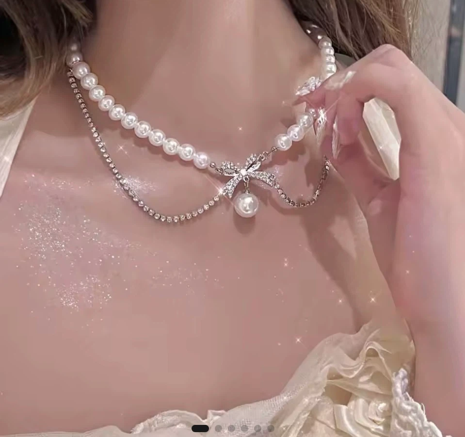 Layered Pearl and Crystal Bow Necklace