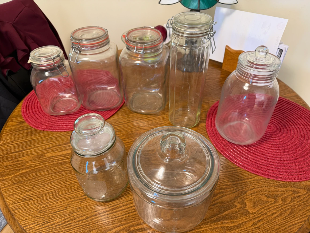 Seven large storage bottles