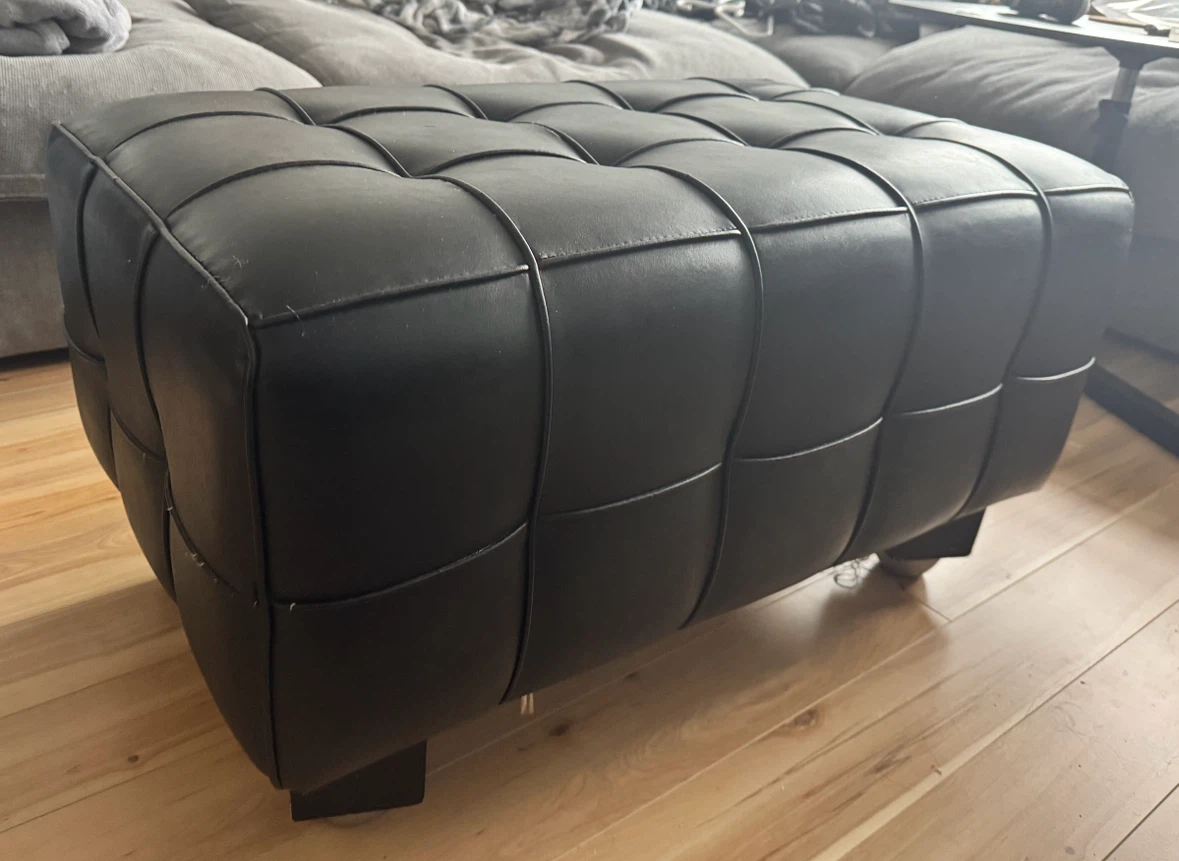 Black Tufted Faux Leather Ottoman