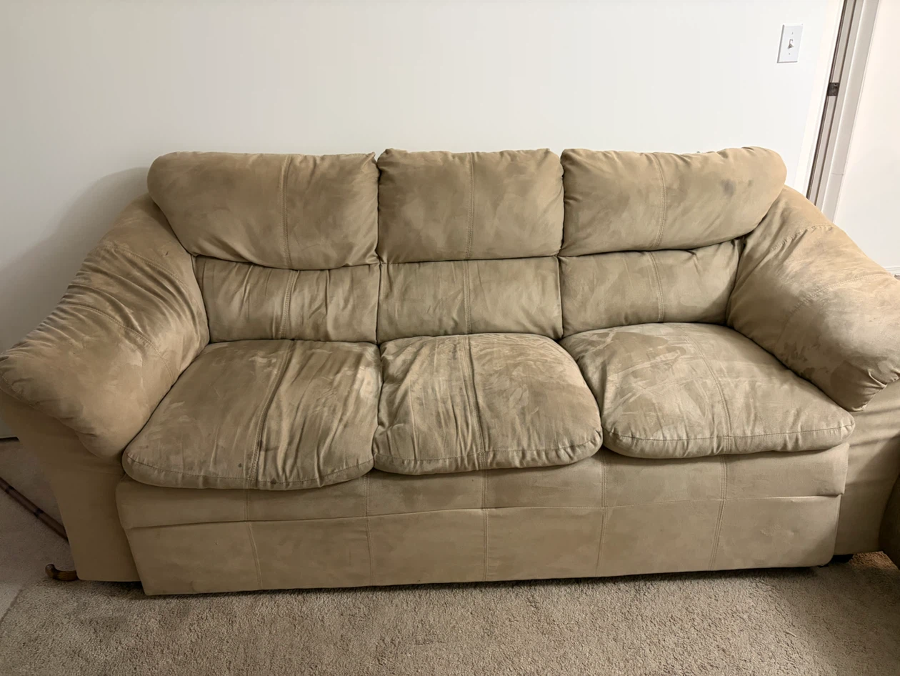 Tan microfiber three-seater sofa