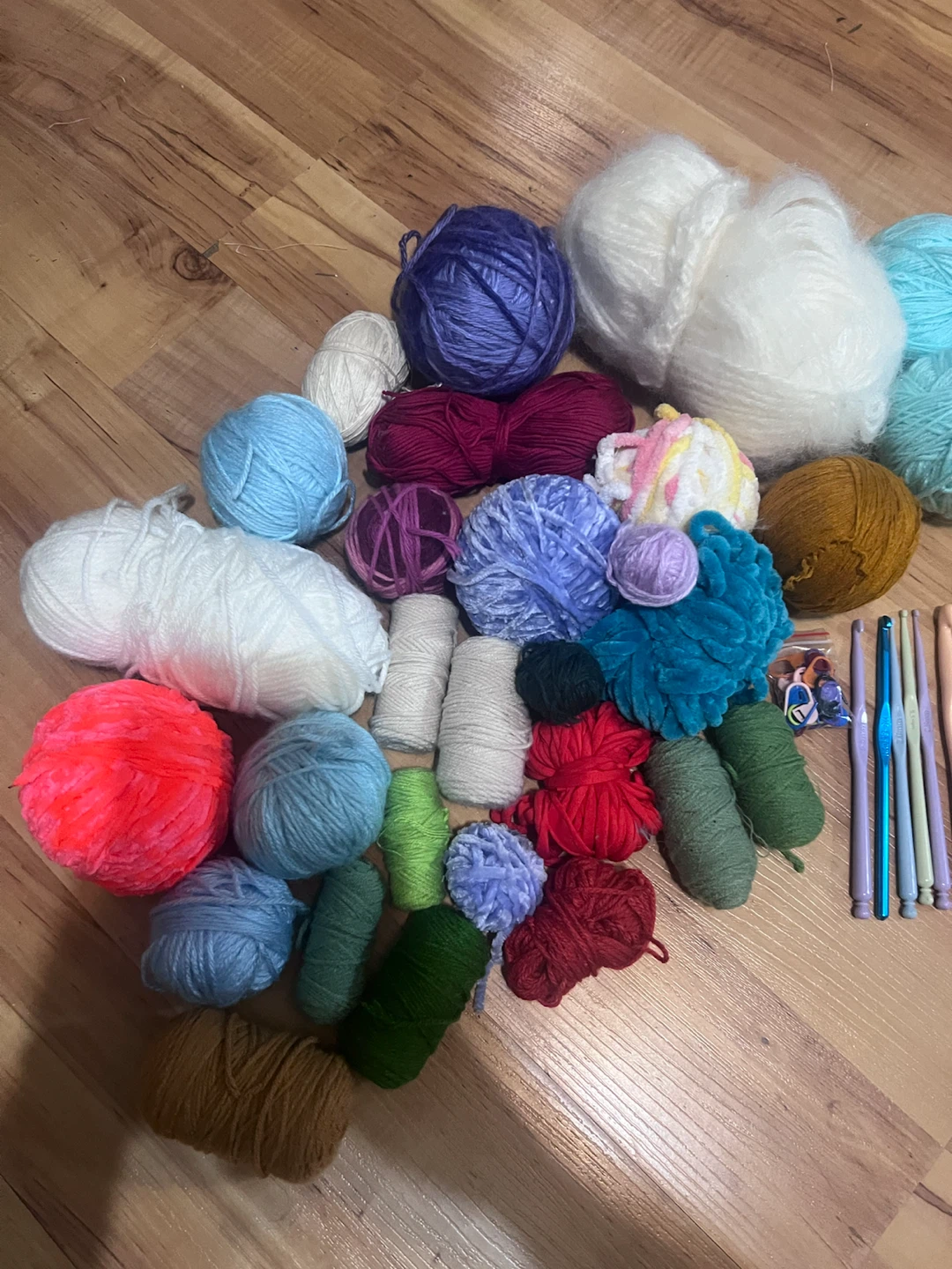Crochet hooks and yarn + plus crochet accessories