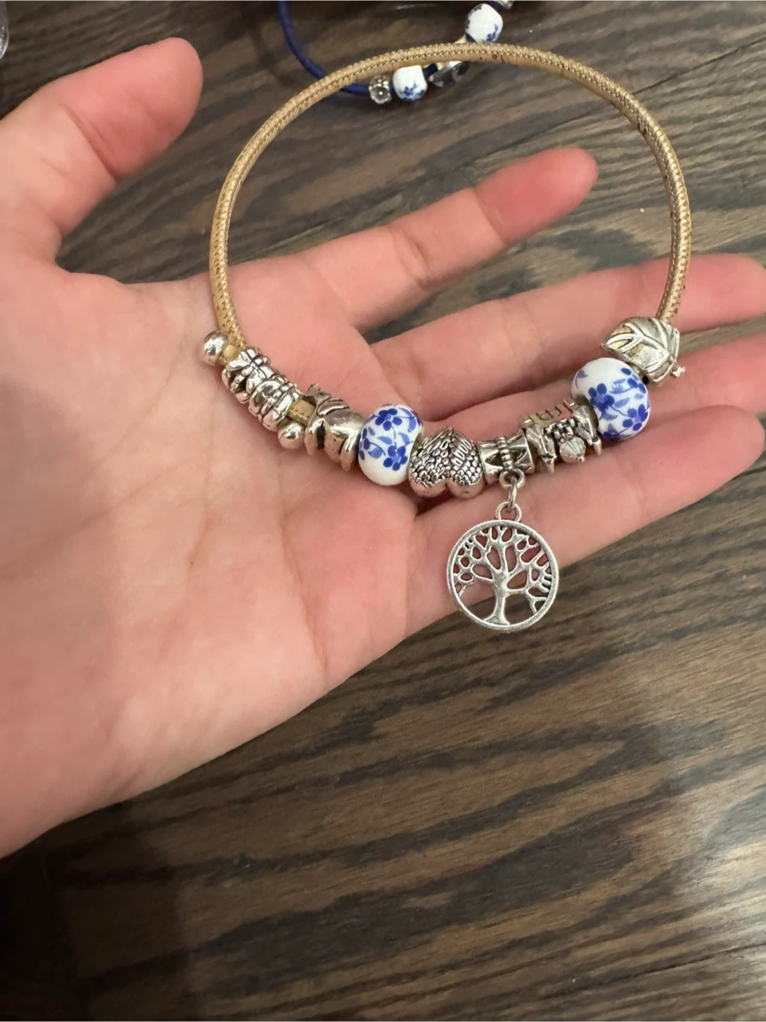 Beaded charm bracelet with tree pendant