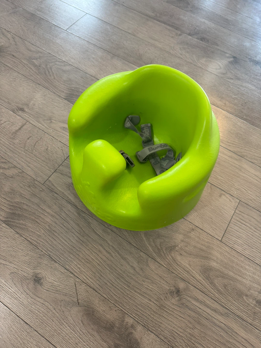Bumbo Floor Seat in Lime Green with harness
