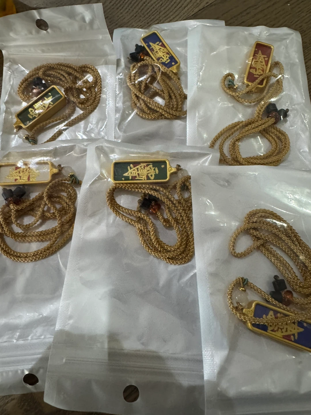 $2 for all Calligraphy Pendants