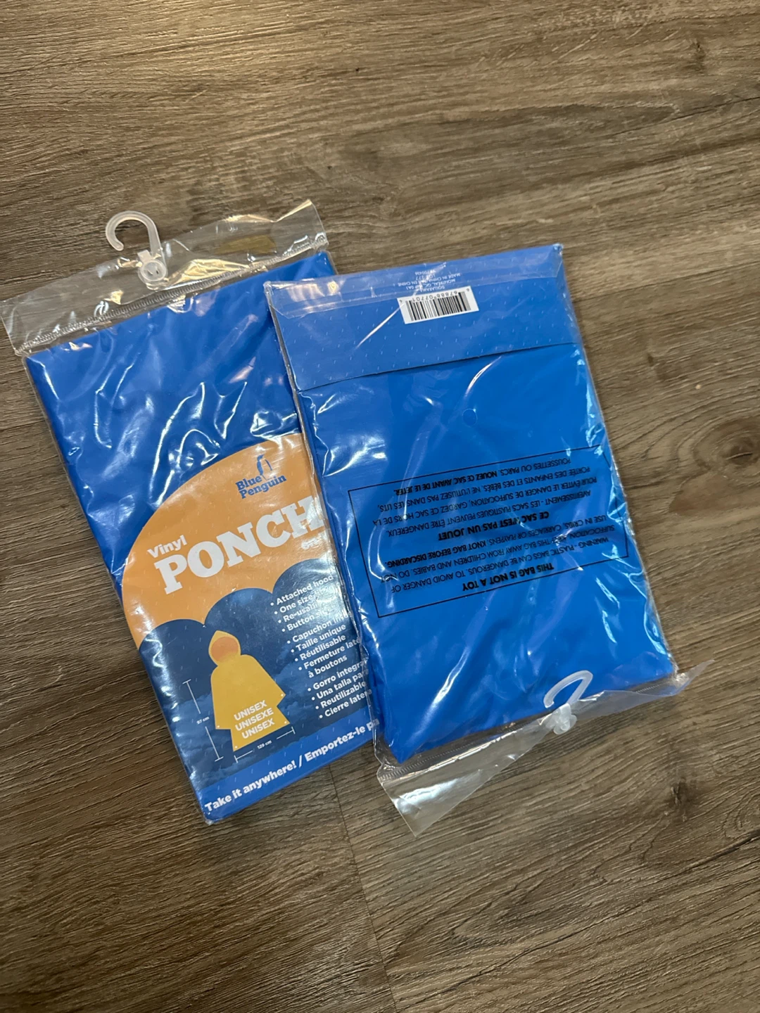 3$ both- Rain coats adults- never opened