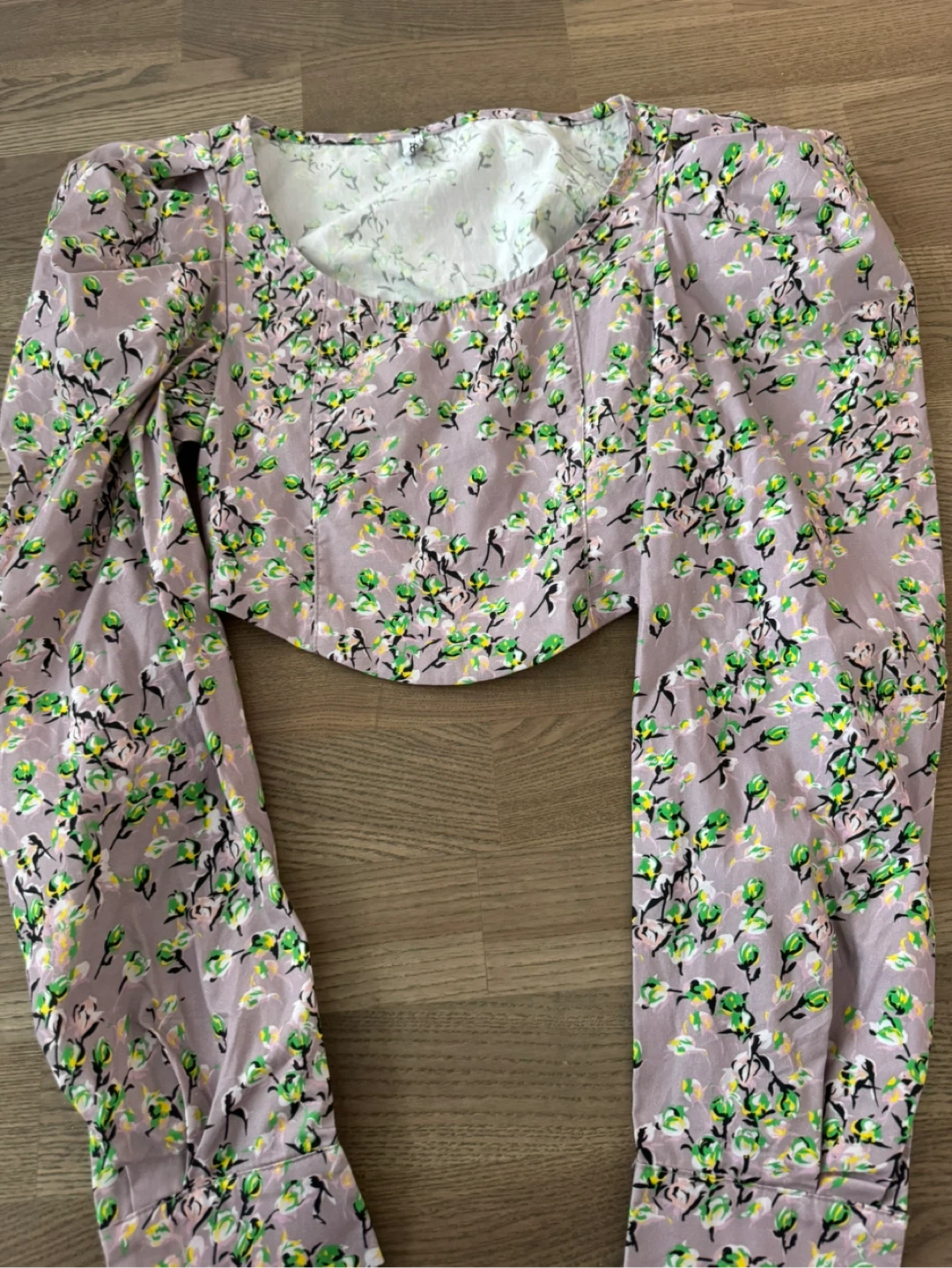 New: Designer’s Floral Body-Hugging Top
