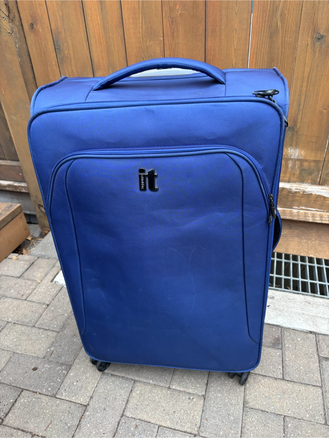 Large Check In  it Luggage blue rolling suitcase