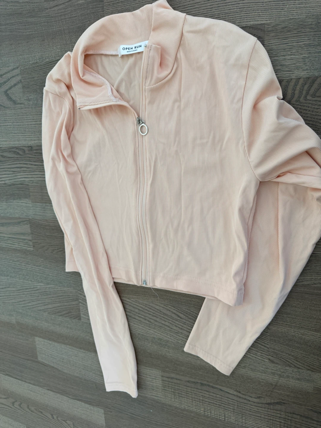 Designer’s ribbed zip-up golf jacket