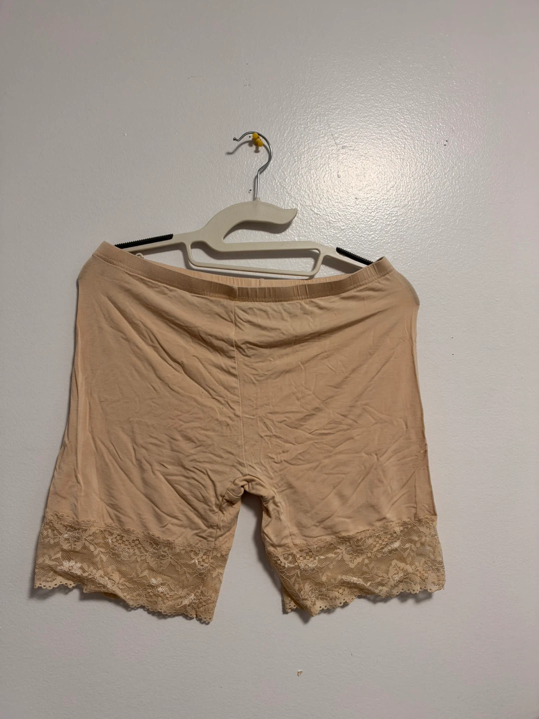 Two pairs of lace-trim slip shorts