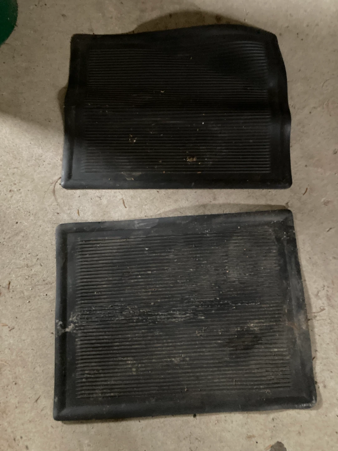 Two Black Rubber Floor Mats
