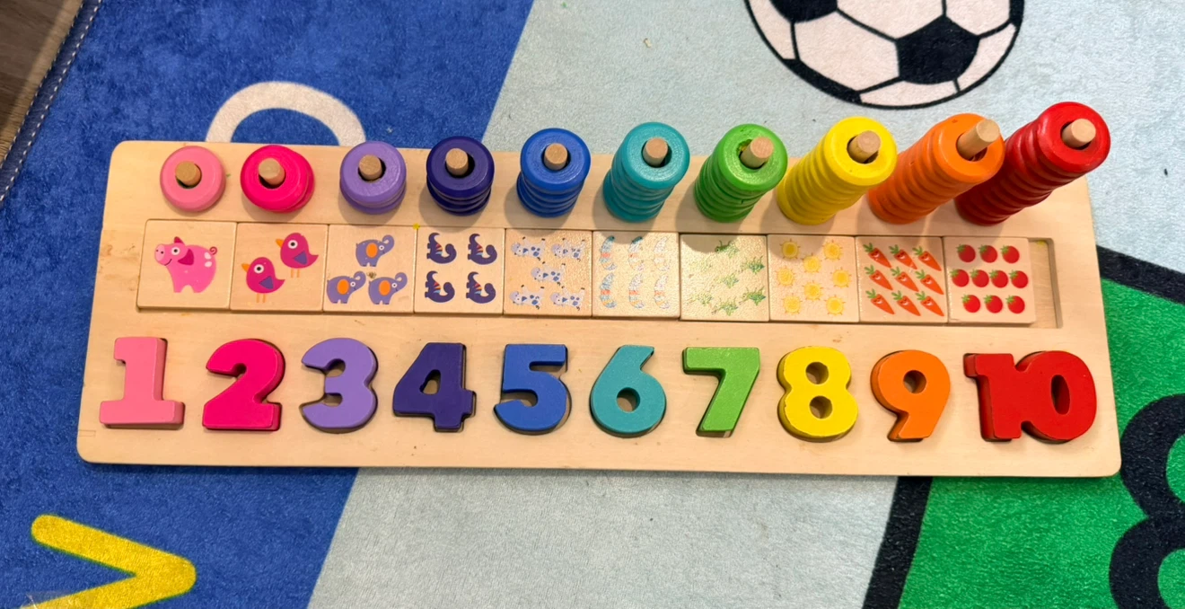 Assorted children's toys and storage rack