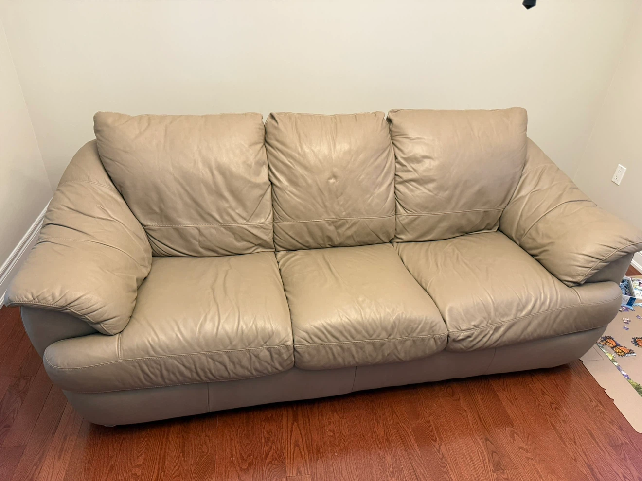 Beige Leather Three-Seater Sofa