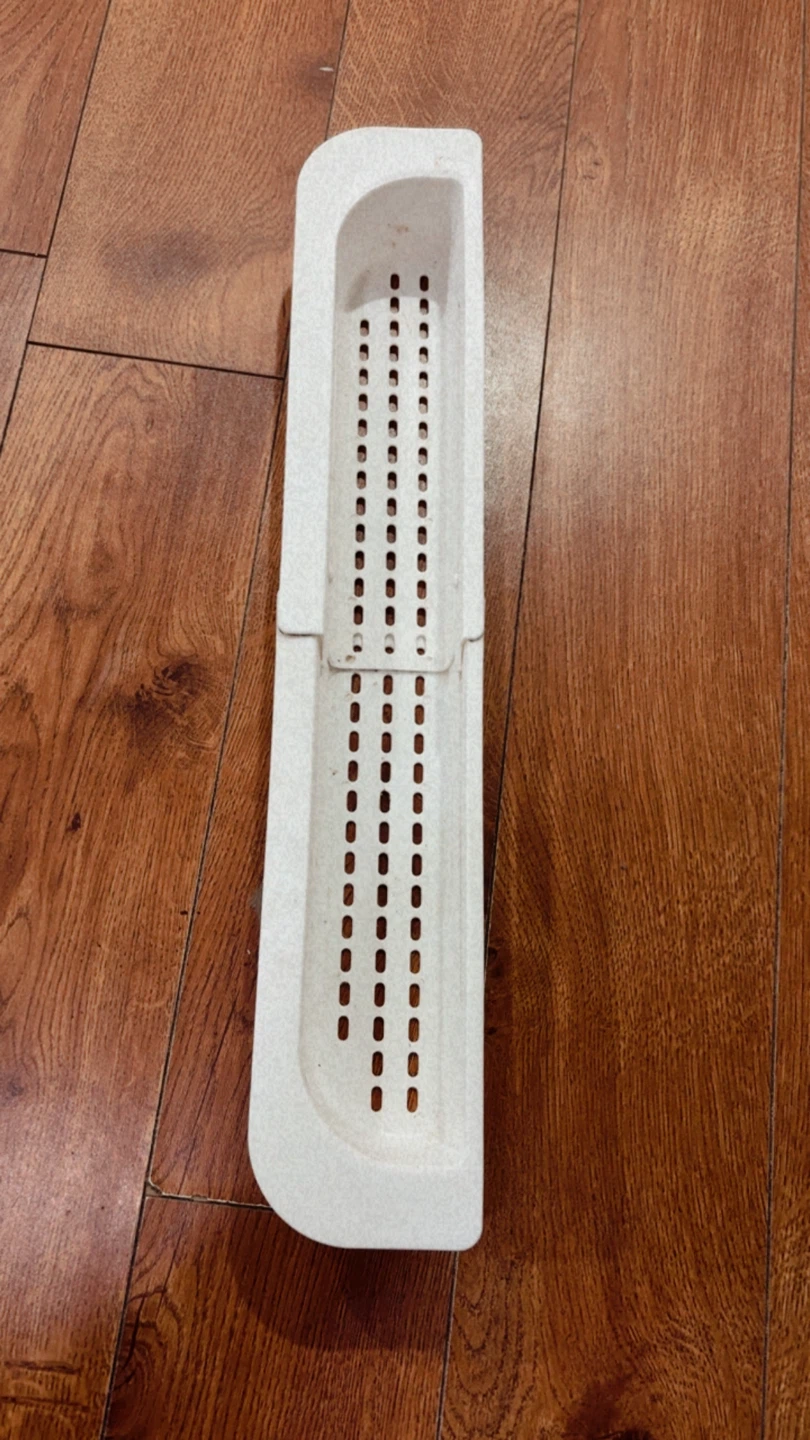 0.25 cents….White Fridge Door Shelf Bin