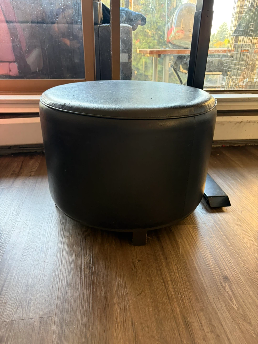 Black Round Faux Leather Ottoman
