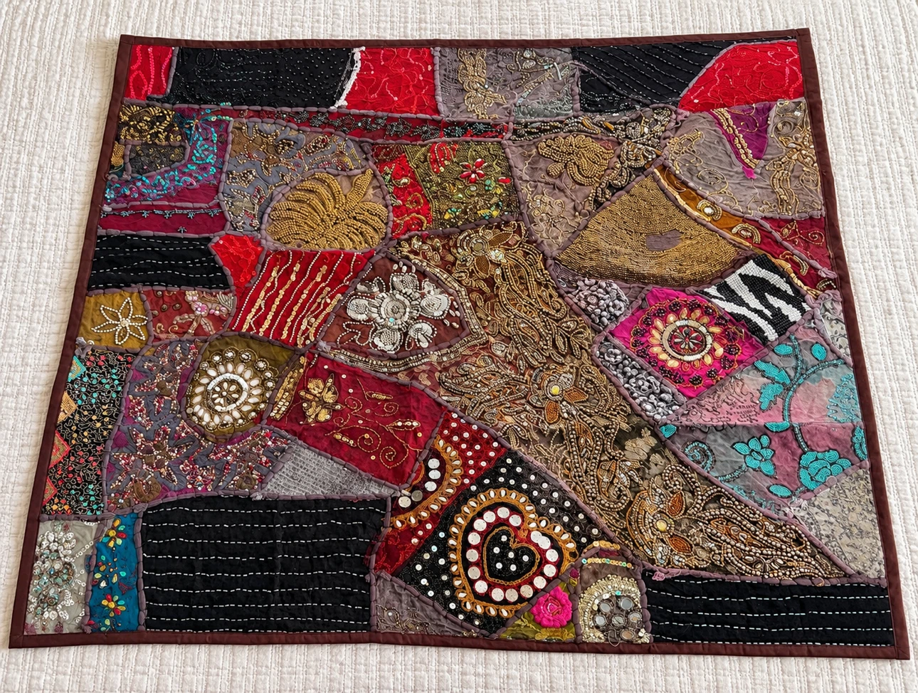 Beautiful handmade decorative patchwork textile / wall hanging
