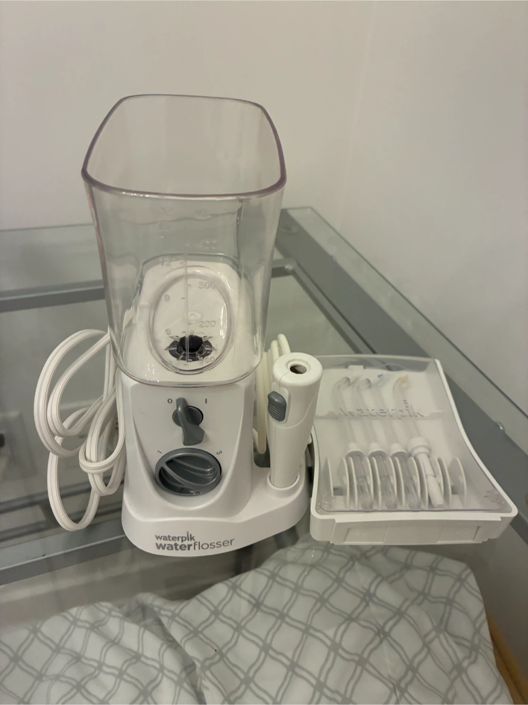 Waterpik Water Flosser (NANO) with 4 unused attachments - photo 4