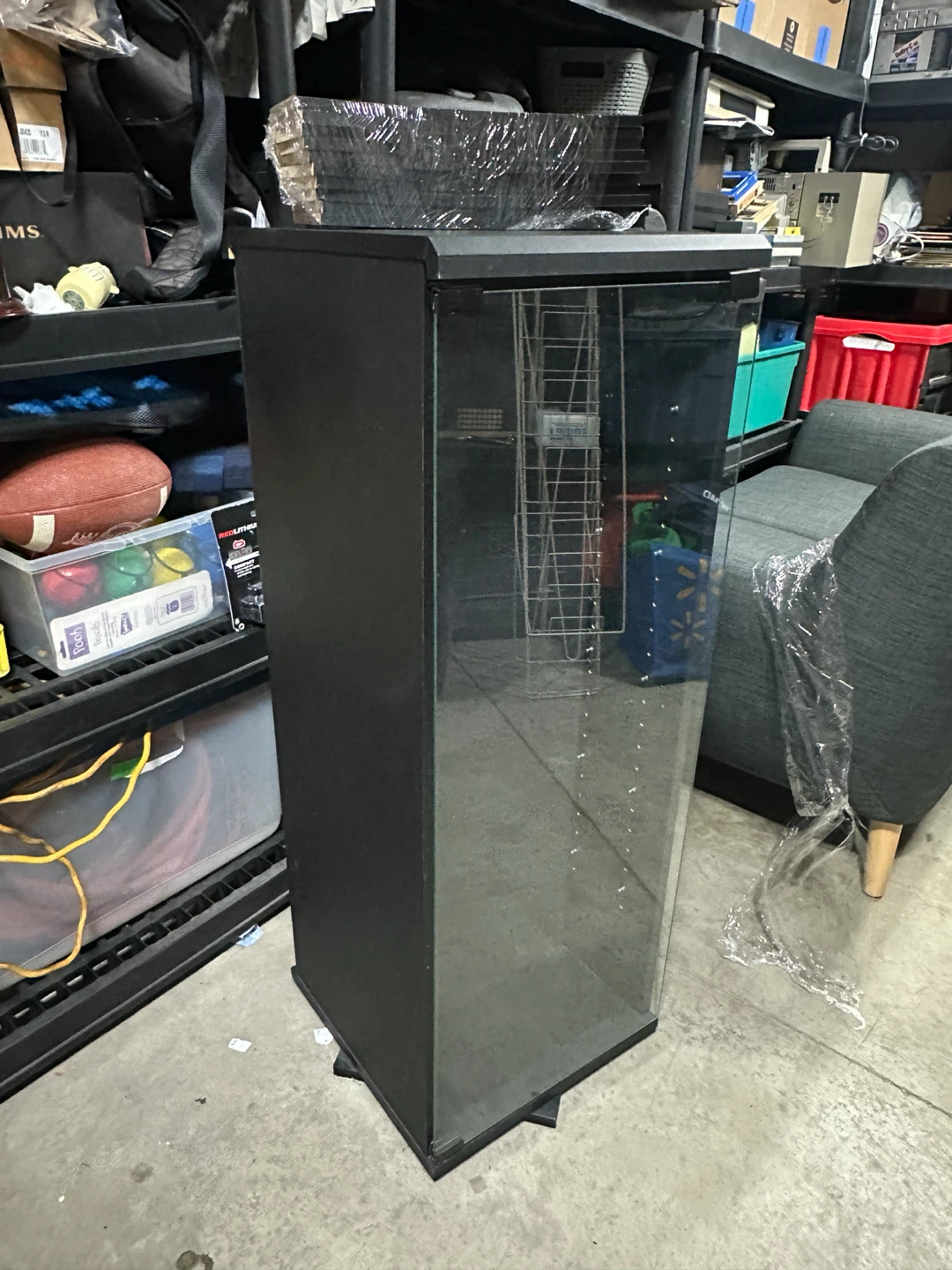 Rotating Black Media Display Cabinet