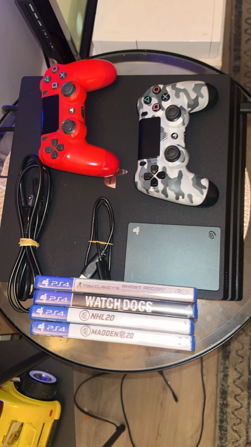 Sony PlayStation 4 Pro Bundle with Controllers and Games