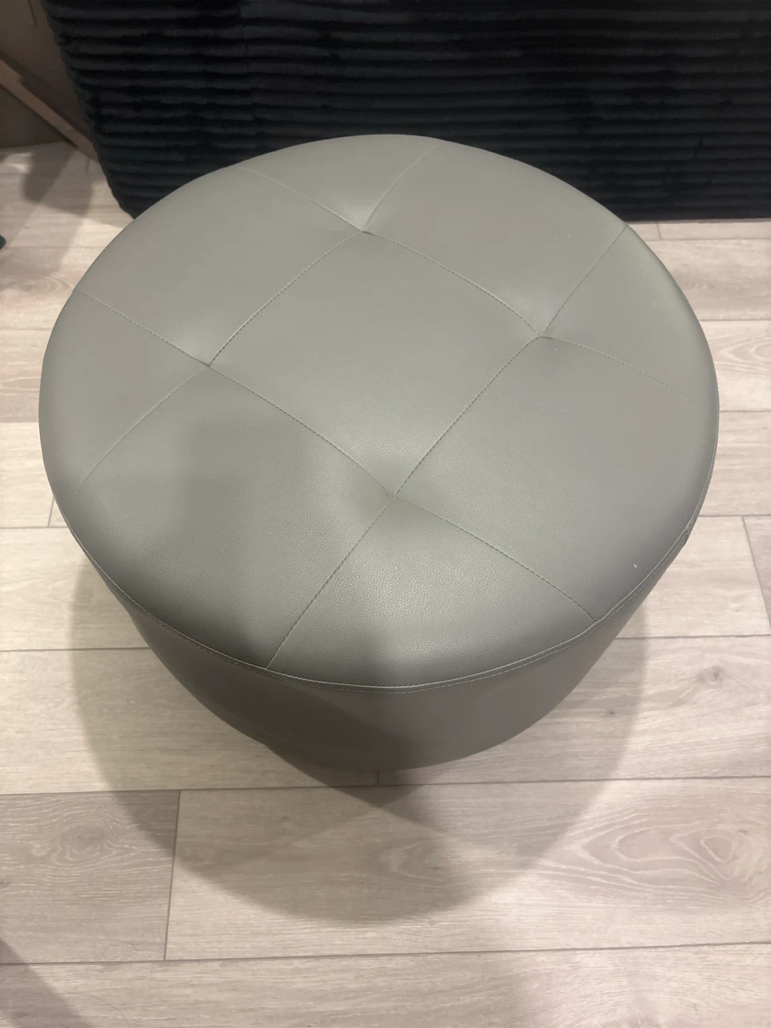 Round Grey Faux Leather Ottoman
