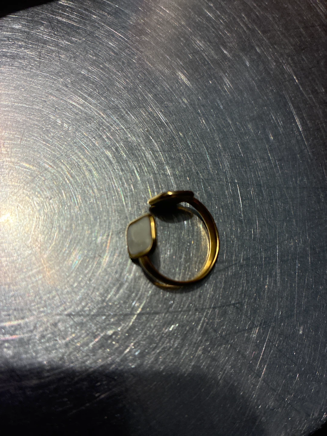 Gold-tone adjustable ring with white stone accents