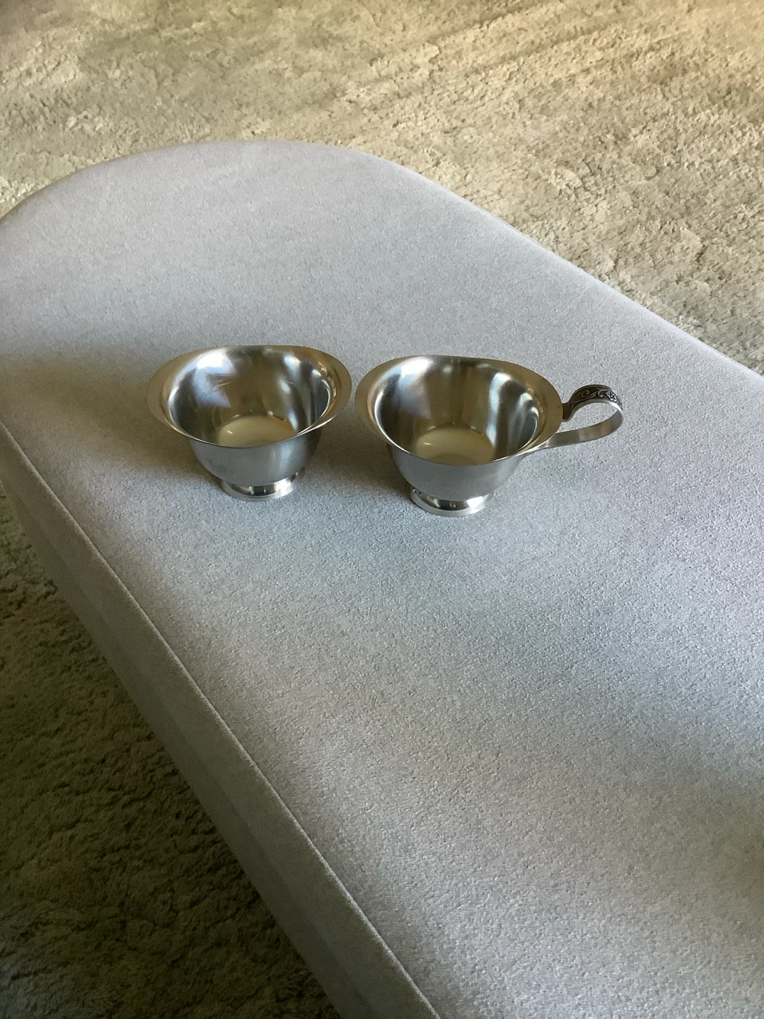 Stainless creamer & sugar bowls.