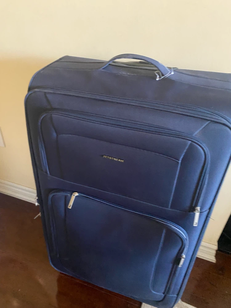 Jetstream blue rolling suitcase