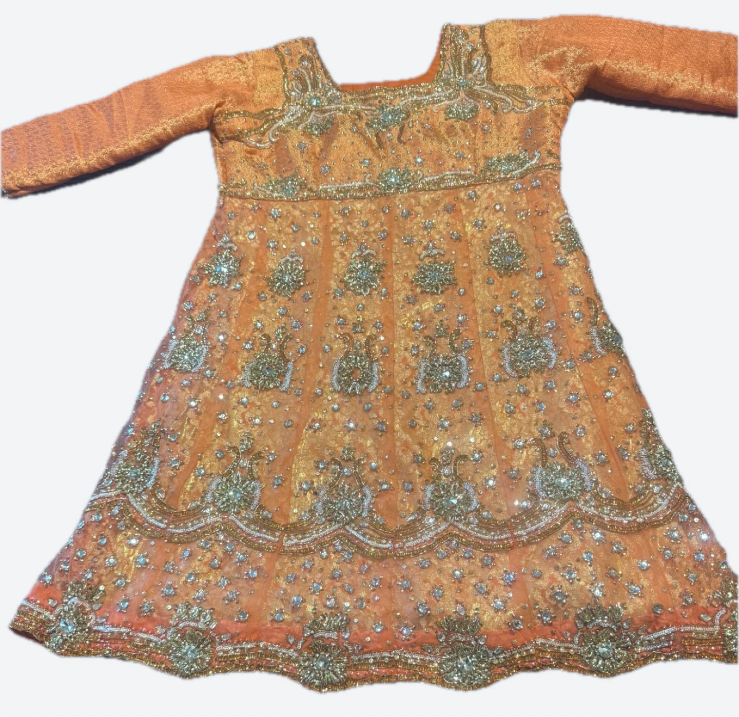 Indian Orange Embroidered outfit set.
