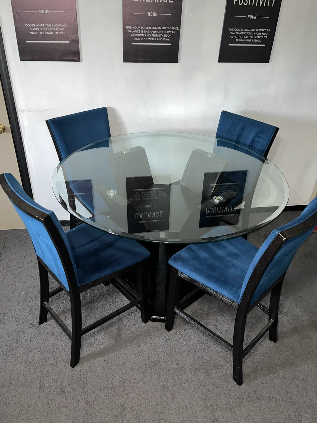 Aria Collection from Bobs Furniture Round Glass Dining Table