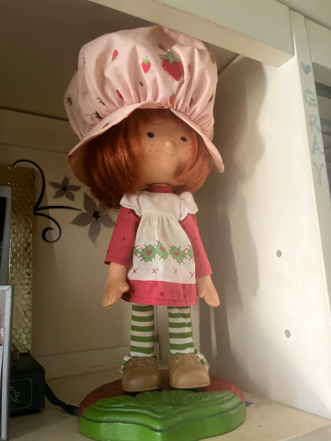 Vintage porcelain Strawberry Shortcake Doll on Display Stand