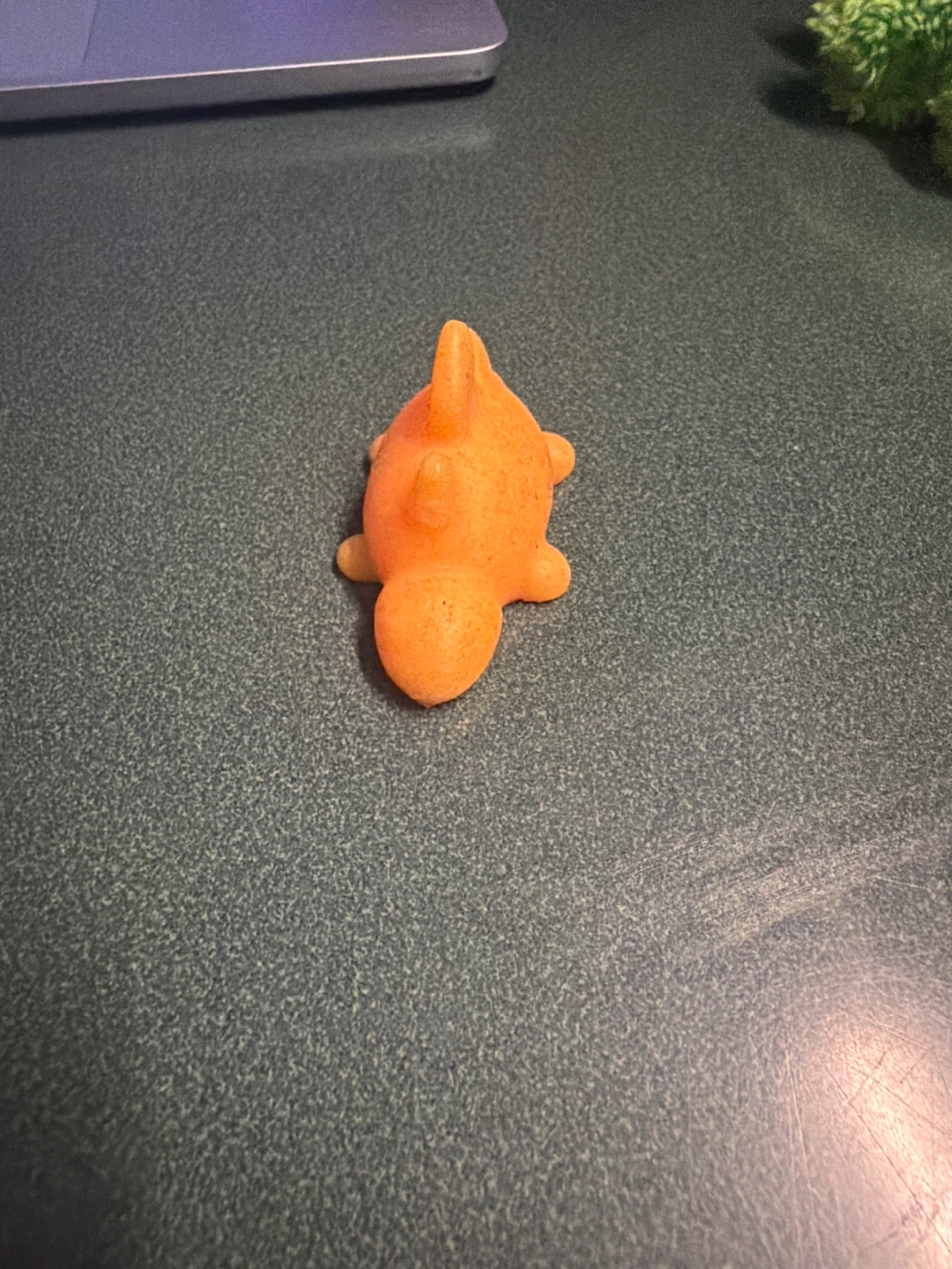 Orange dinosaur squishy toy