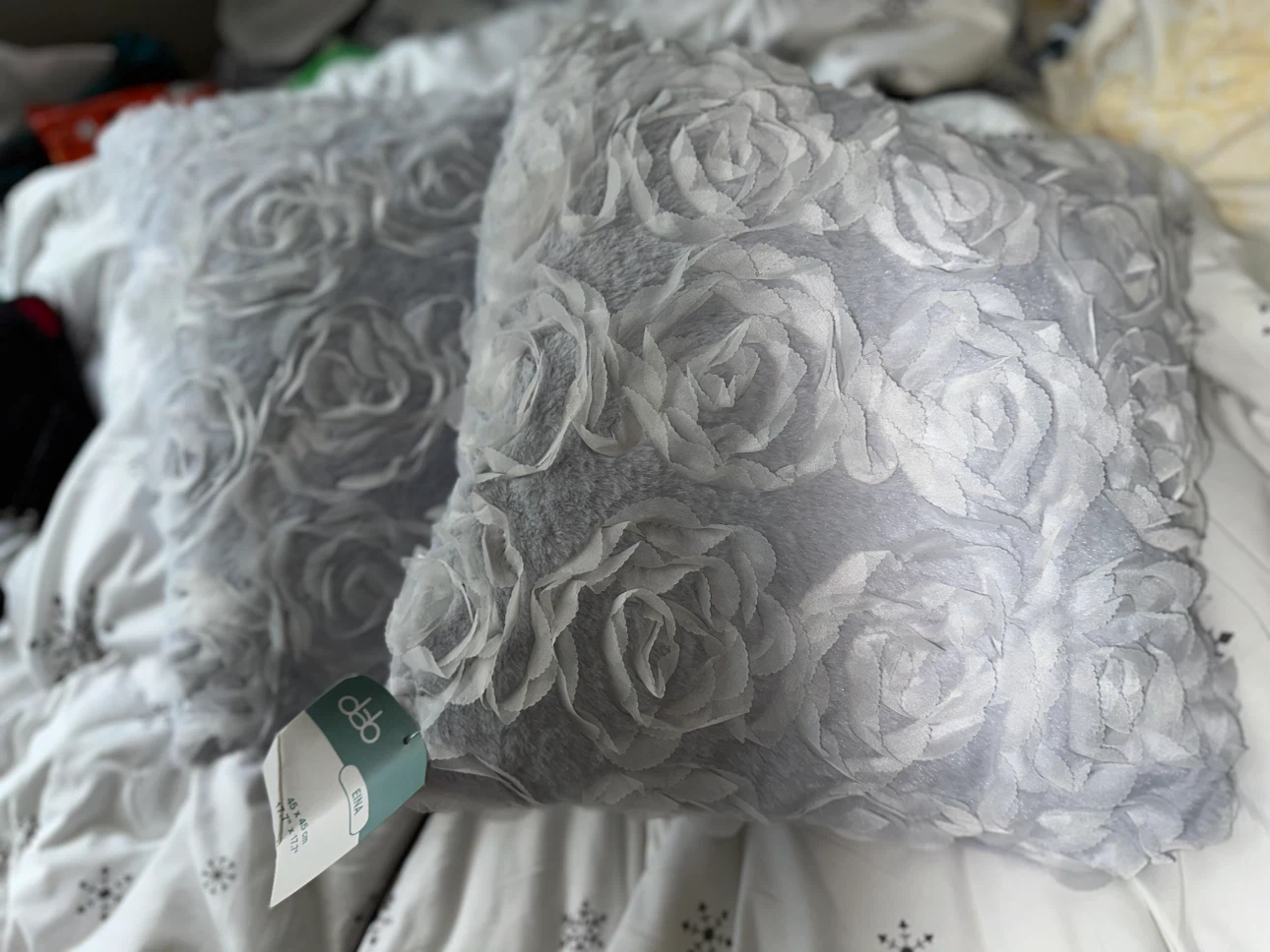 Two Deb Eina decorative cushions