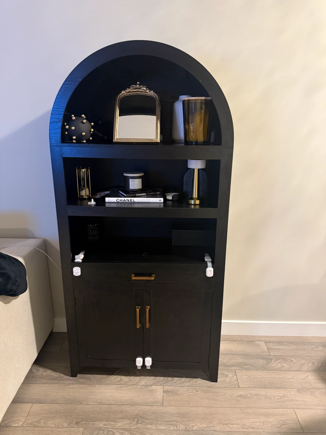 Black arched bookshelf