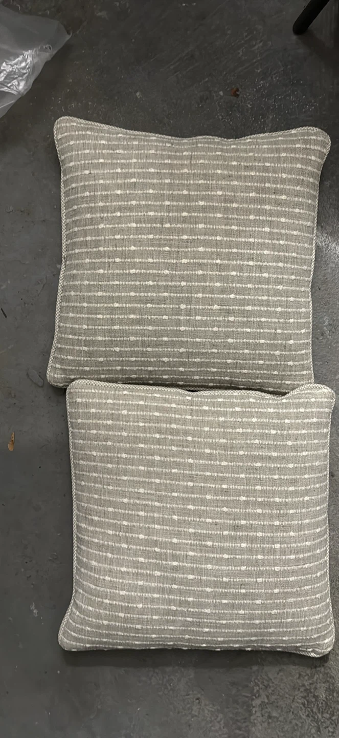 Beige throw cushions