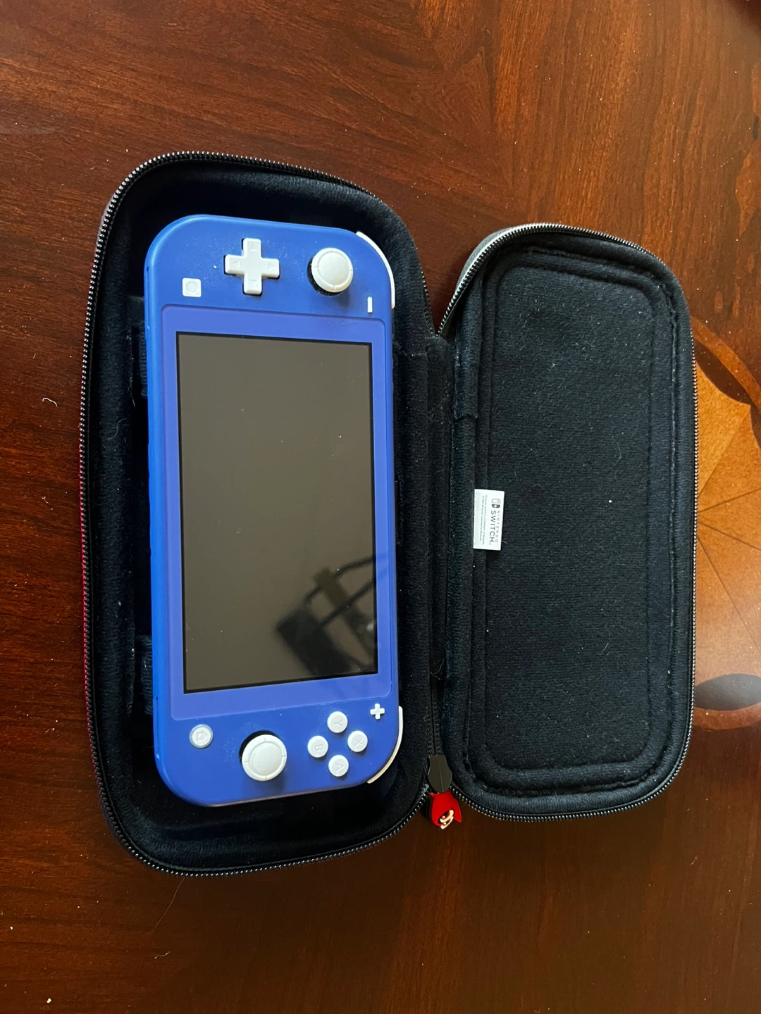 Nintendo Switch Lite + Super Mario Odyssey - photo 3