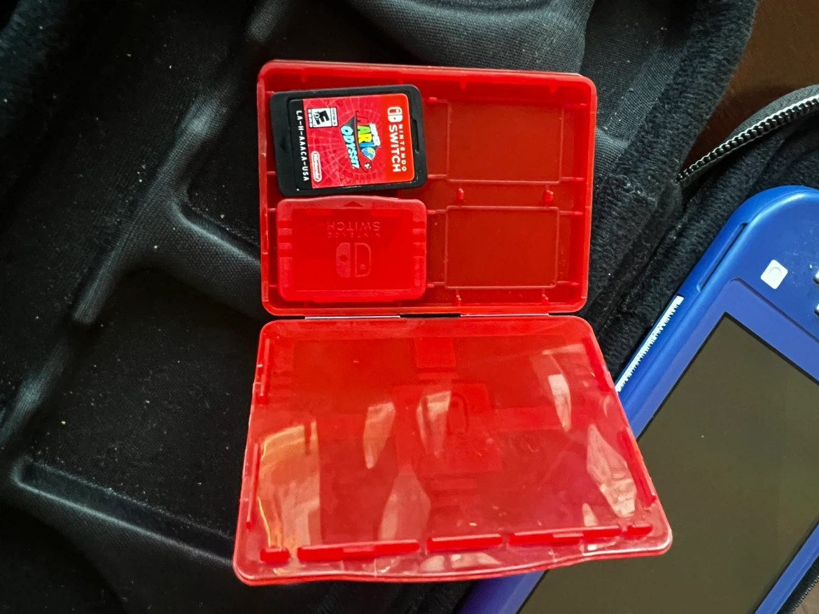Nintendo Switch Lite + Super Mario Odyssey - photo 5