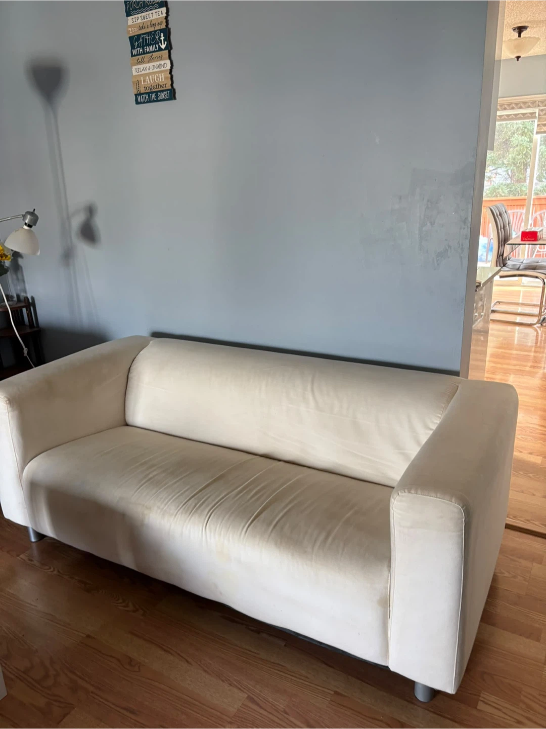 Off-white three-seater sofa