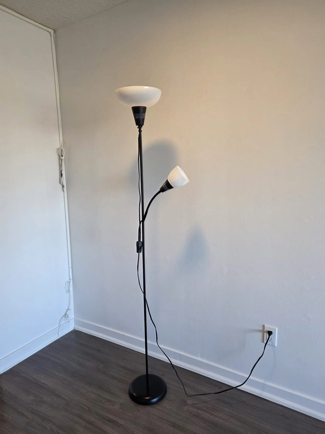 Black floor lamp with reading light