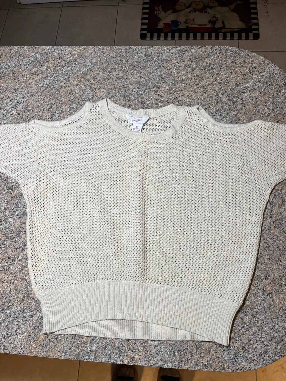 Candie's cream cold shoulder knit top