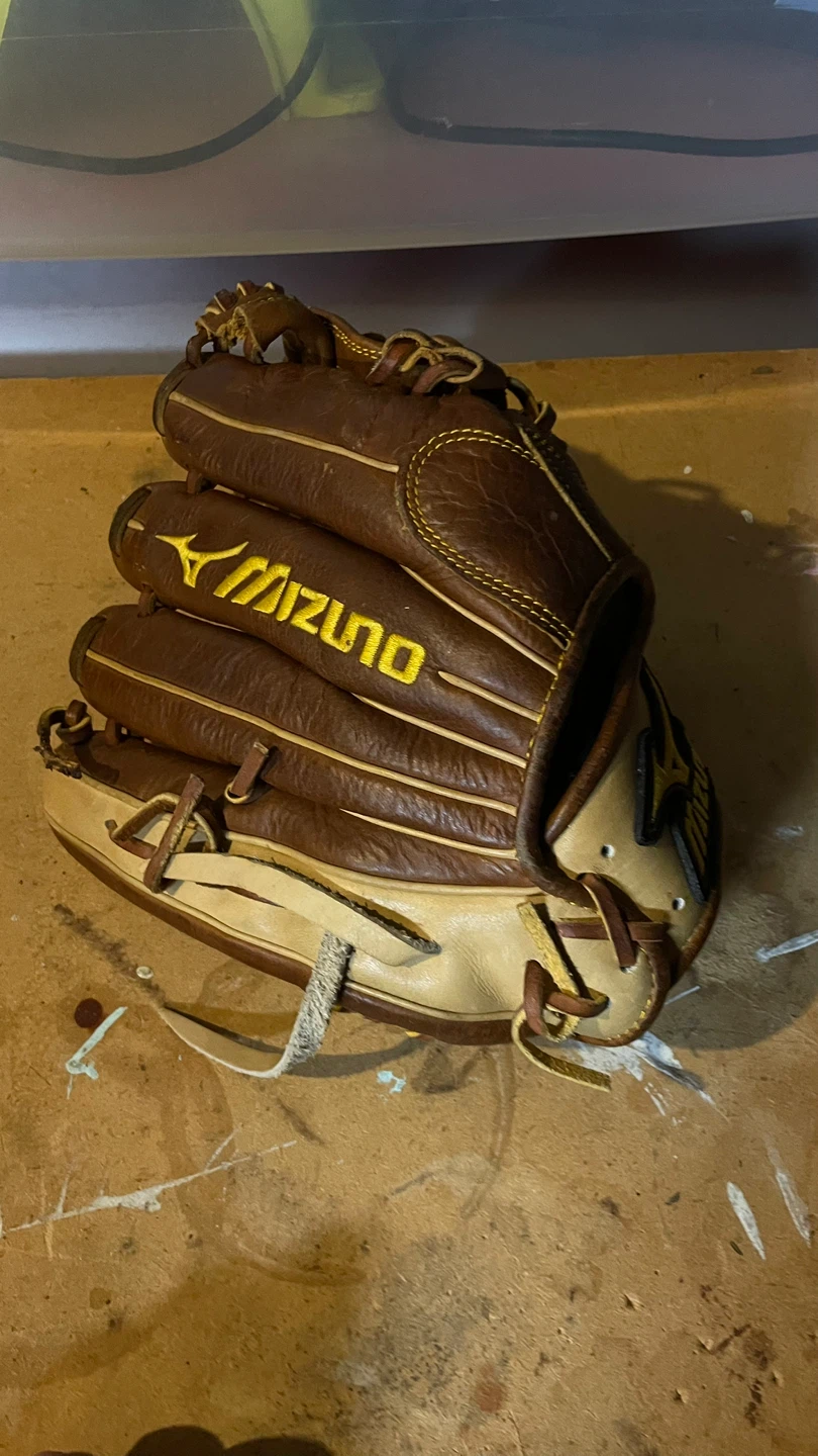 Selection of three baseball gloves