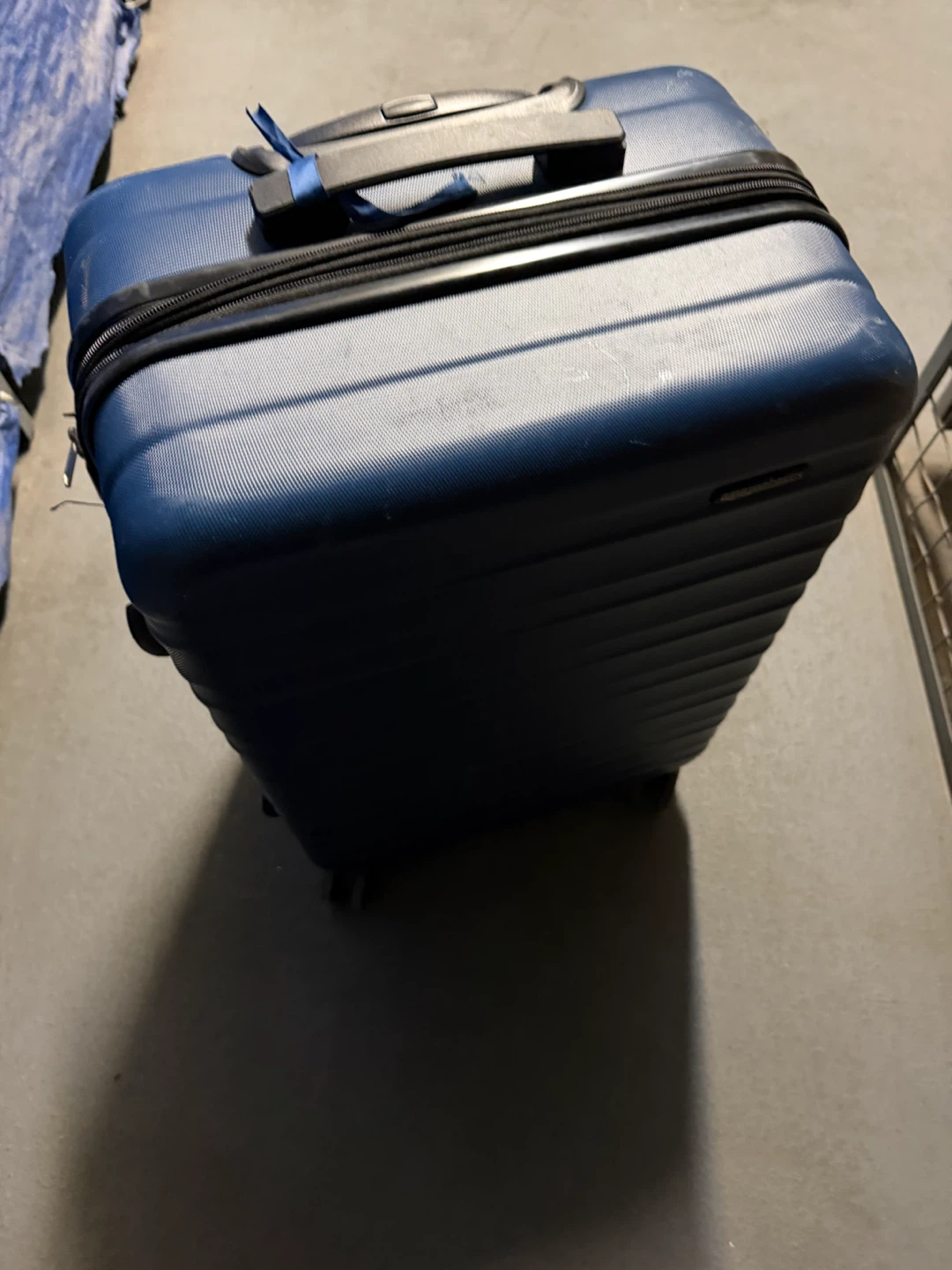 AmazonBasics blue hard-shell spinner luggage - photo 4